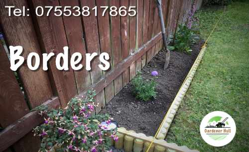 log roll border dividing lawn and flowered area.